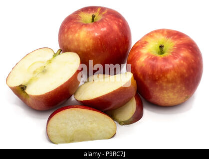 Two whole Kanzi apples, one half, three slices, isolated on white background Stock Photo