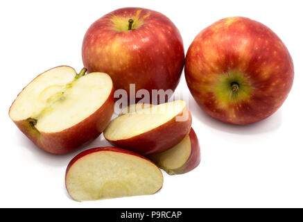 Two whole Kanzi apples, one half, three slices, isolated on white background Stock Photo