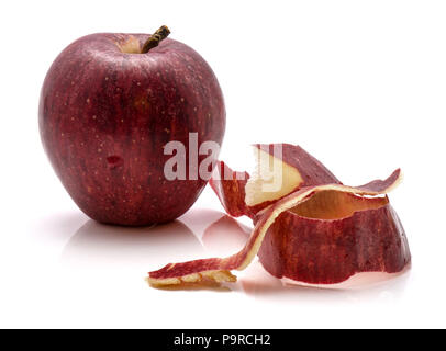 One whole Gala apple with separated rind isolated on white background Stock Photo