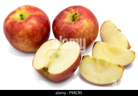 Two whole Kanzi apples, one half, three slices, isolated on white background Stock Photo
