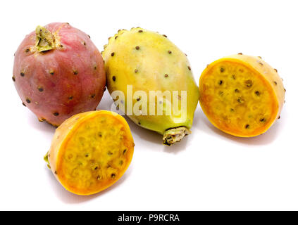 Group of two whole and sliced prickly pears, opuntia red, green and yellow, flesh with seeds, two halves, isolated on white background Stock Photo