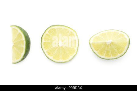 Lime slices collection top view isolated on white background Stock Photo