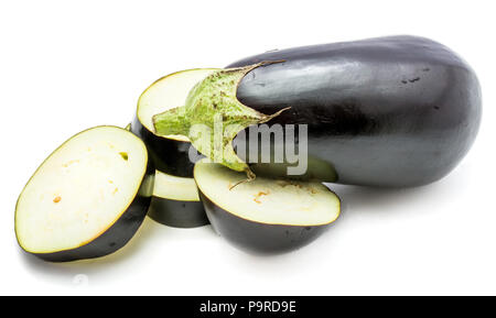 One whole and sliced eggplant (aubergine), cut in round circles, isolated on white background Stock Photo