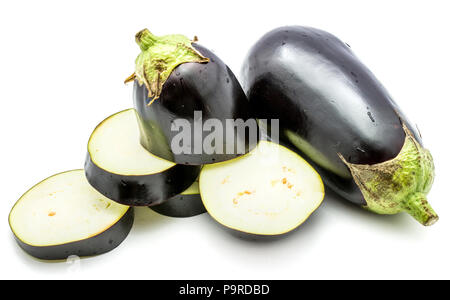 One whole and sliced eggplant (aubergine), cut in round circles, isolated on white background Stock Photo
