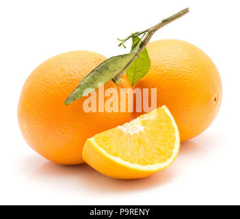Two oranges and one quartered slice isolated on white background one with green leaf Stock Photo