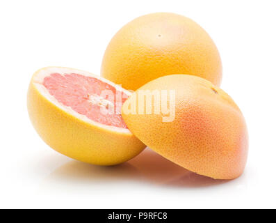 Sliced red grapefruit and one whole isolated on white background Stock Photo