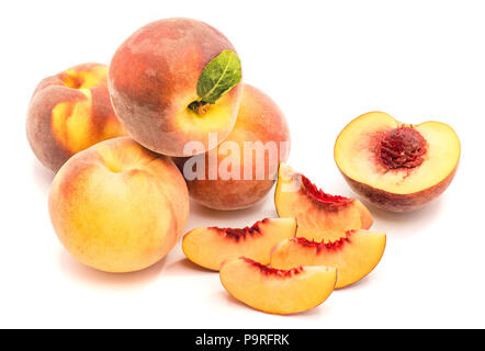 Whole and sliced peaches composition isolated on white background Stock Photo