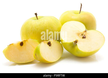 Apples (Smeralda variety) stack isolated on white background two whole green yellow one cross section half and two slices Stock Photo