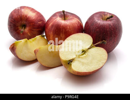 Gala apples, three whole, two slices, one half, isolated on white background Stock Photo