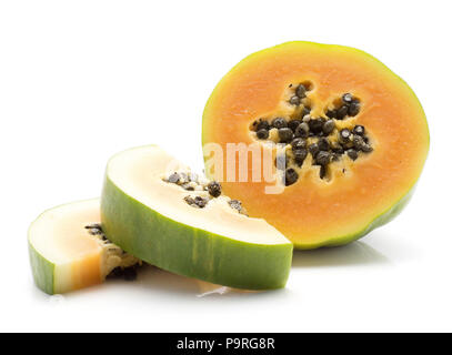Green papaya (pawpaw, papaw) one half two slices black seeds isolated on white background Stock Photo