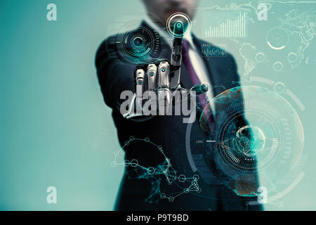 businessman operating virtual hud interface and manipulating elements with robotic hand. Blue holographic screen artificial design concept. Stock Photo