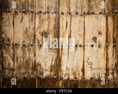 Old wooden door enforced with rivets at Mdina, Malta Stock Photo