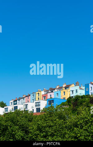 Colourful terraced houses overlooking the dock waterside area of Cliftonwood and Hotwells in Bristol on a sunny summer day. Stock Photo