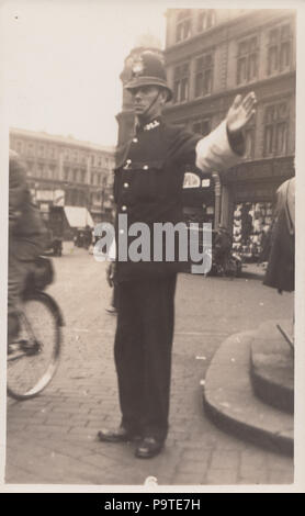 Vintage Photograph of a Police Officer Called Perci Directing Traffic in London Stock Photo