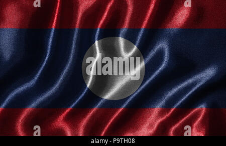 Laos flag - Fabric flag of Laos country, Background and wallpaper of waving flag by textile. Stock Photo