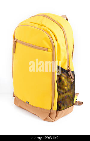 A yellow backpack isolated on white background. Stock Photo