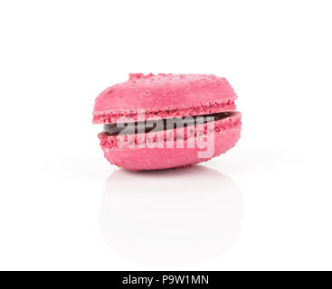 Pink French macaron isolated on white background one with raspberry jam Stock Photo