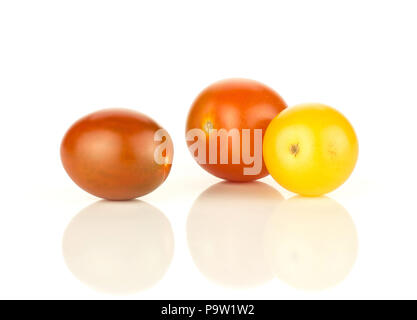 Three grape cherry tomatoes mix isolated on white background yellow black red whole Stock Photo