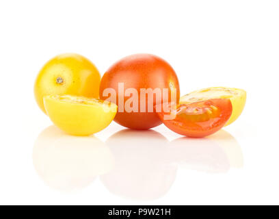 Grape cherry tomatoes mix set isolated on white background two whole yellow and red varieties three sliced pieces Stock Photo