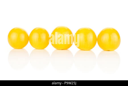 Yellow grape cherry tomatoes isolated on white background five in row Stock Photo
