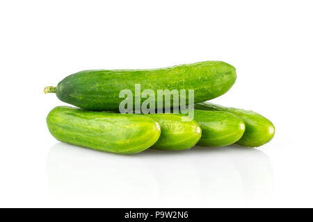 Five fresh green mini cucumbers isolated on white background Stock Photo