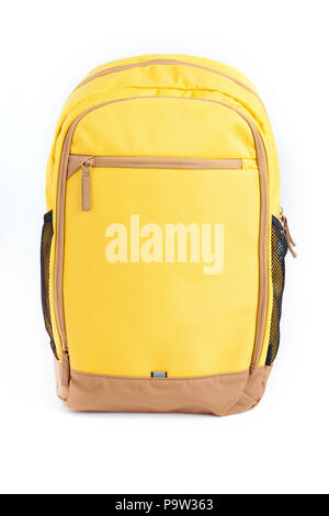 A yellow backpack isolated on white background. Stock Photo