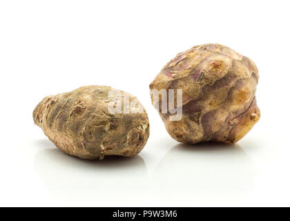 Jerusalem artichokes isolated on white background two sweet crisp topinambur Stock Photo