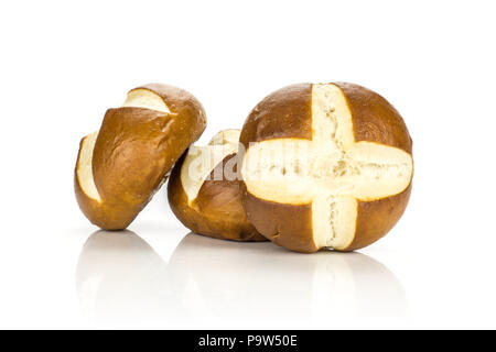 Fresh Bavarian bread buns isolated on white background three baked loaves Stock Photo