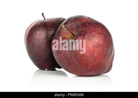 Two red delicious apples deep red isolated on white background Stock Photo