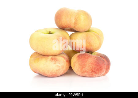 Fresh ripe Saturn peaches heap isolated on white background Stock Photo