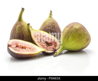 Three figs and two sliced halves rose flesh isolated on white background ripe fresh purple green Stock Photo