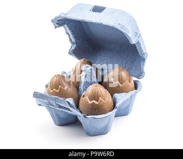Chocolate eggs in a blue box isolated on white background Stock Photo