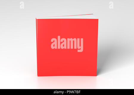 Blank red square soft cover book standing on white background. Isolated with clipping path around book Stock Photo