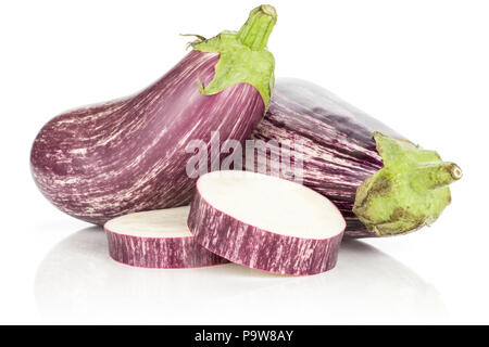 Two striped purple eggplants with two sliced rings isolated on white background Stock Photo