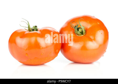 Two red tomato with vine ends isolated on white background fresh whole Stock Photo