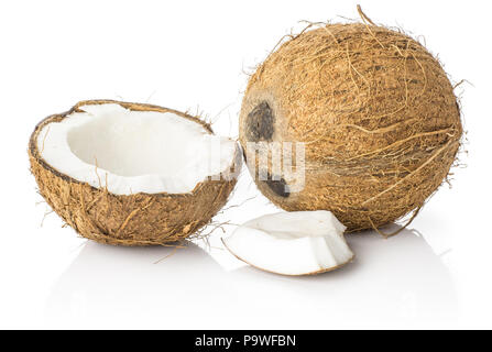 Coconut half with one piece isolated on white background brown fibrous ...