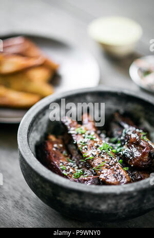 modern gourmet asian style barbeque spicy pork ribs with sweet soy sauce set meal Stock Photo