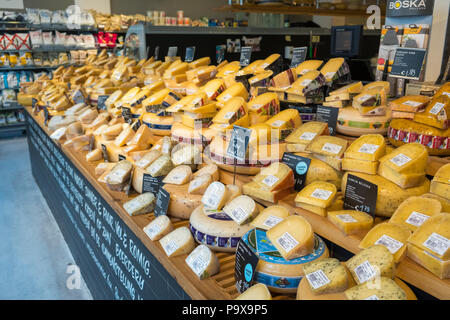 Cheeses on display in a cheese shop in Amsterdam, Netherlands, Holland, Europe Stock Photo