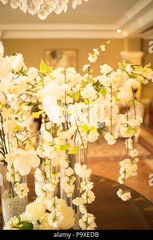Beautiful flowers in luxury five star hotel wedding marriage party before guests arrive. Stock Photo