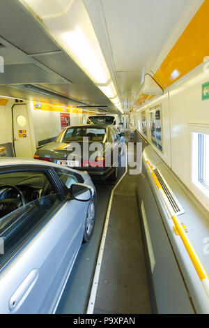 Vehicles parked on the Channel Tunnel, or Chunnel, Shuttle, train carrying them from England to France Stock Photo