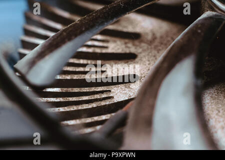 Dust on the computer pc processor cooler with mainboard and computer case fragment. Selective focus. Stock Photo