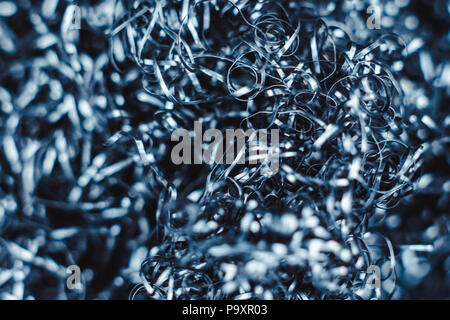 a bunch of metal wire entangled lies Stock Photo