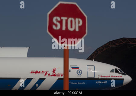 The Ilyushin Il-96-400T cargo airplane of Polet Cargo Airlines seen behind the STOP sign at Ulyanovsk-East Airport, Russia. The type showed itself unp Stock Photo