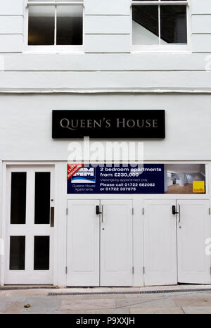 Queen House premises with estate agent board advertising residential apartments for sale, viewing by appointment only Stock Photo