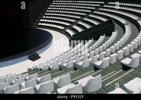 The grandstands of a modern summer outdoor amphitheater and a stage for small entertainment events Stock Photo