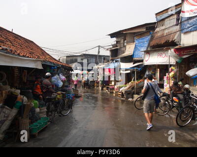 Life in Pasar Ikan and Muara Karang, a historic Jakarta fish market. Travel in Jakarta, the Capital of Indonesia. 4th October, 2012 Stock Photo