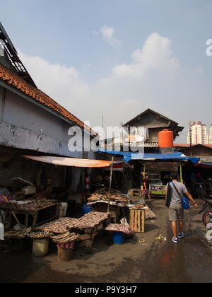 Life in Pasar Ikan and Muara Karang, a historic Jakarta fish market. Travel in Jakarta, the Capital of Indonesia. 4th October, 2012 Stock Photo