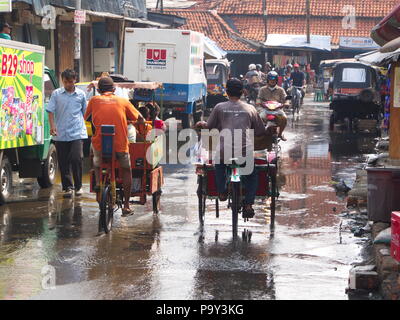 Life in Pasar Ikan and Muara Karang, a historic Jakarta fish market. Travel in Jakarta, the Capital of Indonesia. 4th October, 2012 Stock Photo