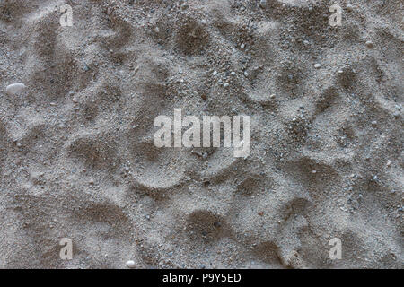 Picture of sand on a beach with some small stones Stock Photo