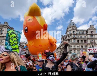 Anti Trump Protestors Carry An ‘Angry Baby’ Inflatable Blimp Mocking The President Through The Streets Of Central London, London, England Stock Photo